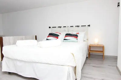 Letto o letti in una camera di La Sirena a Mergellina