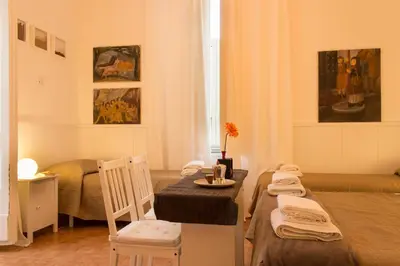 Letto o letti in una camera di Sui Tetti Di Napoli Apartment