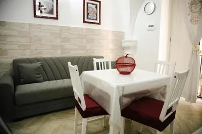Area soggiorno di Home Maria