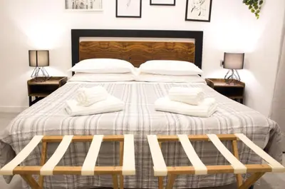 Letto o letti in una camera di It's Napoli Apartment