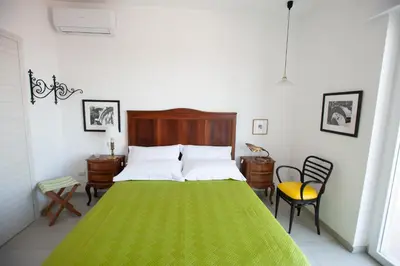Letto o letti in una camera di B&B ICHOME NAPOLI - Maison d'Artiste
