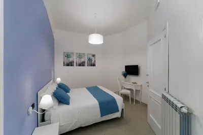 Letto o letti in una camera di Suite & Luxury Rooms Palazzo Diomede Carafa