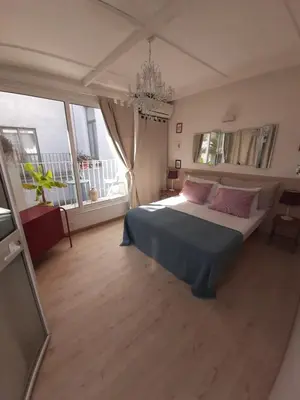 Letto o letti in una camera di Tribunali Panoramic apartment with terrace