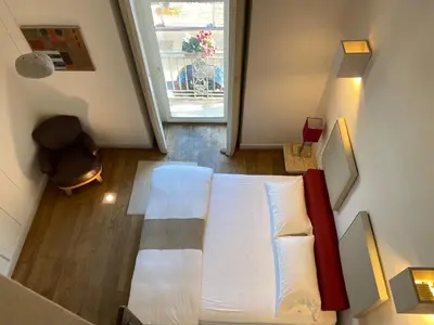 Letto o letti in una camera di Micalò Art Rooms
