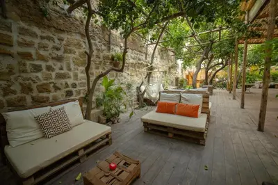 Area soggiorno di HOPESTEL Secret Garden Napoli