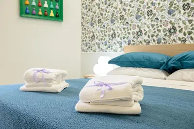 Letto o letti in una camera di Dimora San Gennaro 10