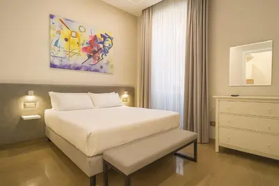 Letto o letti in una camera di Sanfelice 33 Luxury Suites