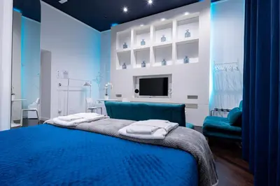 Letto o letti in una camera di Skyhouse Duomo