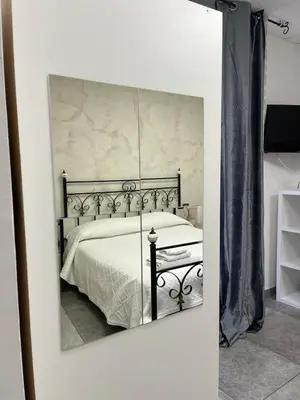 Letto o letti in una camera di riccia, frolla e babbà