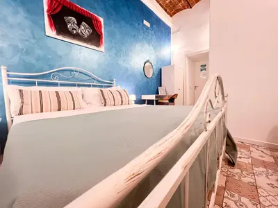 Letto o letti in una camera di Suite Scarlatti