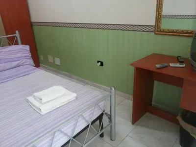 Letto o letti in una camera di Astra
