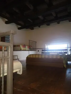 Letto o letti in una camera di IL Cinquecento