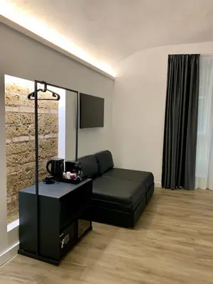 TV o dispositivi per l'intrattenimento presso Toledo Boutique Rooms