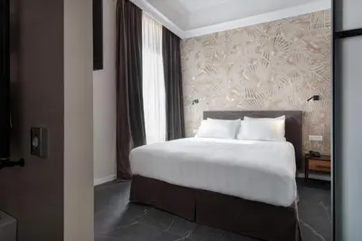 Letto o letti in una camera di Hotel Poerio 25 Boutique Stay