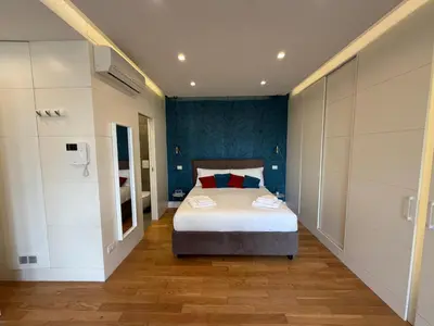 Letto o letti in una camera di Napoli City Center - Appartamenti e Camere