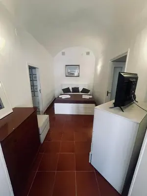 Letto o letti in una camera di MAMs HOUSE