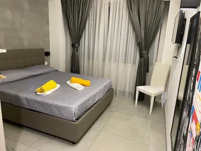 Letto o letti in una camera di Napoli Via Toledo