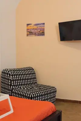 TV o dispositivi per l'intrattenimento presso Napoli centro apartment A balcony in the heart of naples