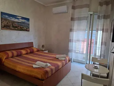 Letto o letti in una camera di Napoli central