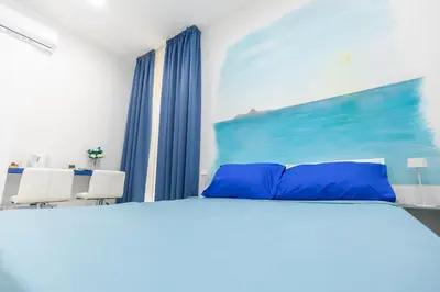 Letto o letti in una camera di Napoli Museo bed and breakfast