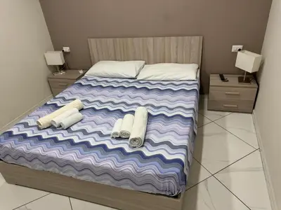 Letto o letti in una camera di Mignone Luxury House