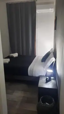 Letto o letti in una camera di Casa Napul'è