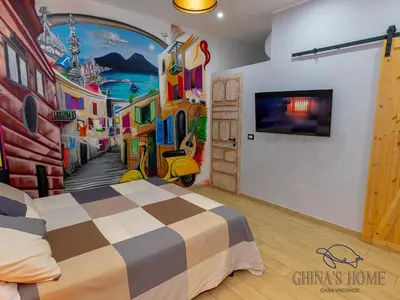 Letto o letti in una camera di Ghina's home