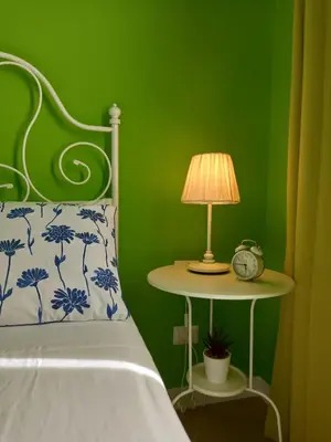 Letto o letti in una camera di B&B Stella Scugnizza