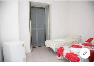 Letto o letti in una camera di Camera Greta