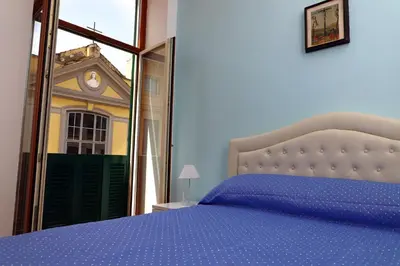 Letto o letti in una camera di Casa Rosati