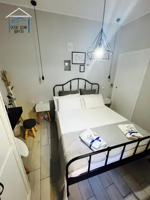 Letto o letti in una camera di Your Home Napoli