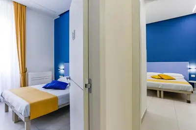 Letto o letti in una camera di V10 GUEST HOUSE - Vanvitelli 10