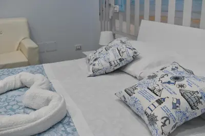 Letto o letti in una camera di Nammuratè - Casa Vacanze