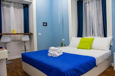 Letto o letti in una camera di Inner Naples