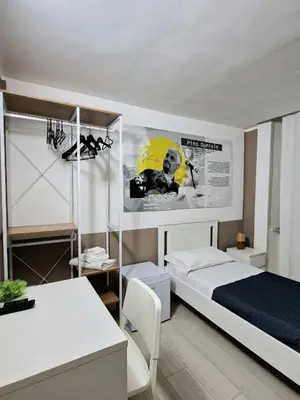 Letto o letti in una camera di Le stanze di Partenope