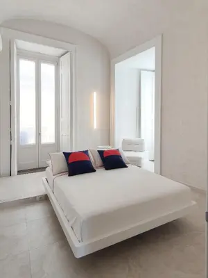 Letto o letti in una camera di Casa Celeste Aida