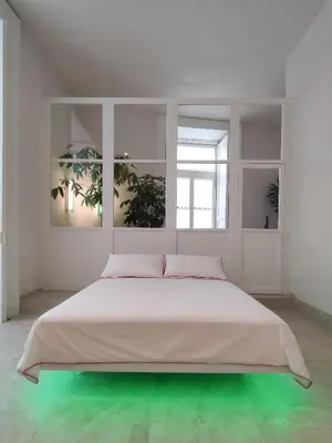 Letto o letti in una camera di Casa Celeste Aida