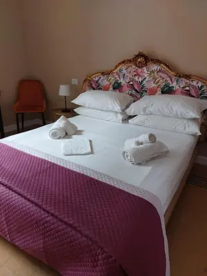 Letto o letti in una camera di B&B o' Panar al Duomo