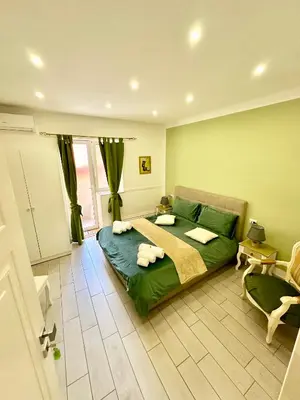 Letto o letti in una camera di Gloves Rooms