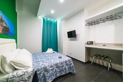 Letto o letti in una camera di B&b Onda Napoli