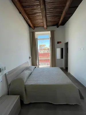 Letto o letti in una camera di CASA KHRIS