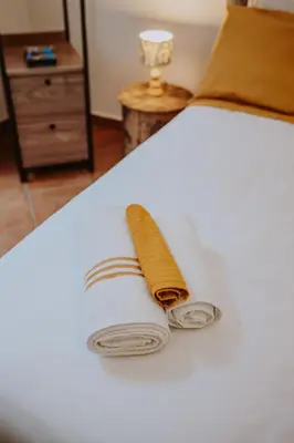 Letto o letti in una camera di San Gregorio Luxury Apartments