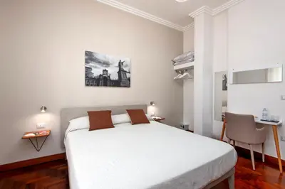 Letto o letti in una camera di LE STANZE DI PARTENOPE