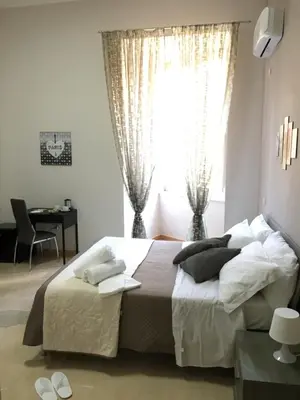 Letto o letti in una camera di Soggiorno Paradiso