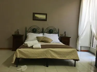 Letto o letti in una camera di Soggiorno Paradiso