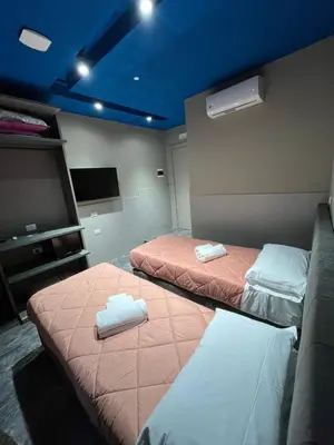 Letto o letti in una camera di Mia Suites Hotel Bella Capri