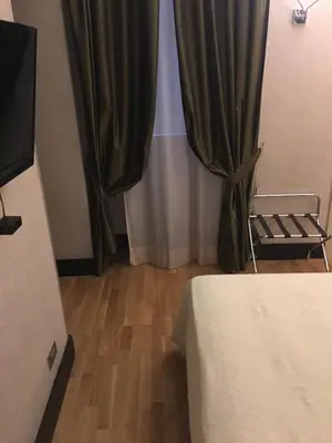 Letto o letti in una camera di MH Design Hotel