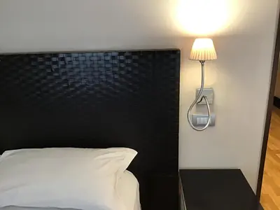 Letto o letti in una camera di MH Design Hotel