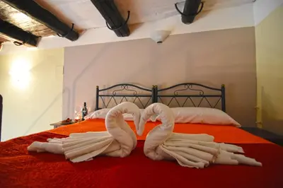 Letto o letti in una camera di Case Così Apartments - Napoli