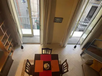 Area soggiorno di Case Così Apartments - Napoli